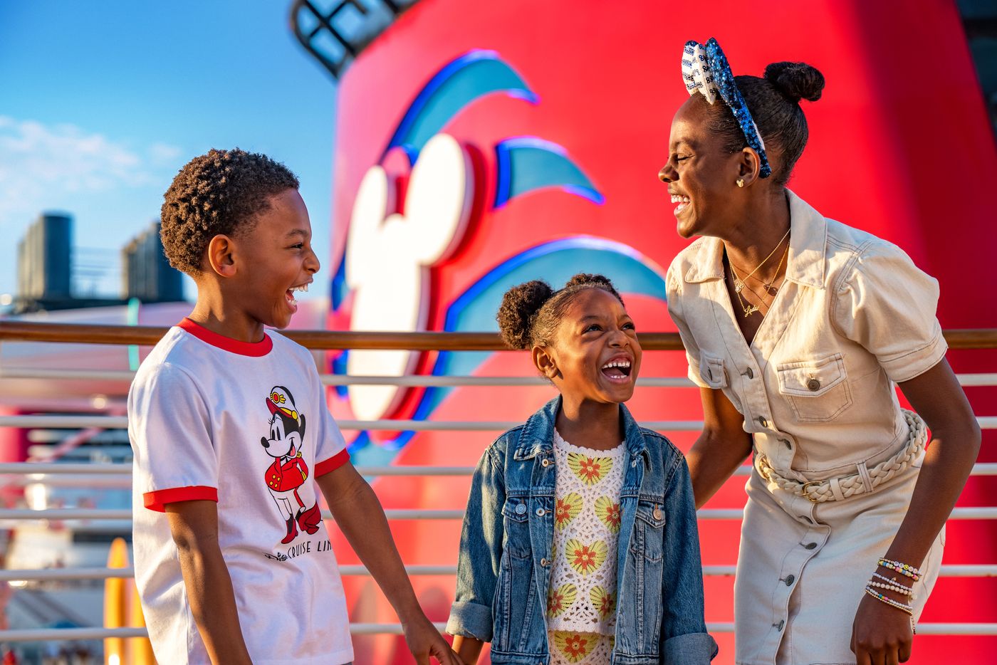 A family meeting Mickey Mouse on a Disney cruise